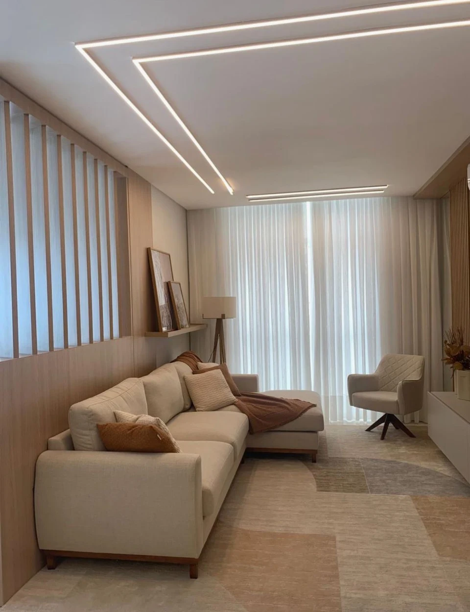 A residential lounge reference with a timber feature wall.