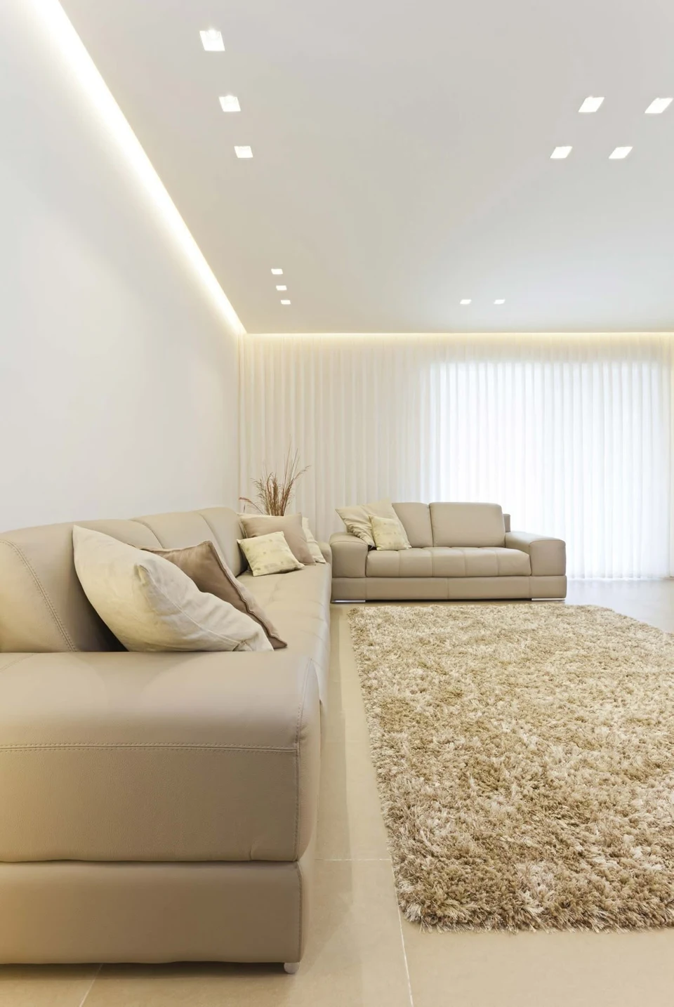 A residential lounge reference with generous neutral seating.